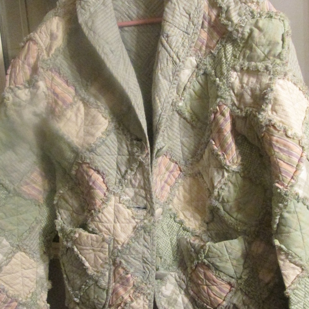 a Quilted coat  by DONNA SHARP
